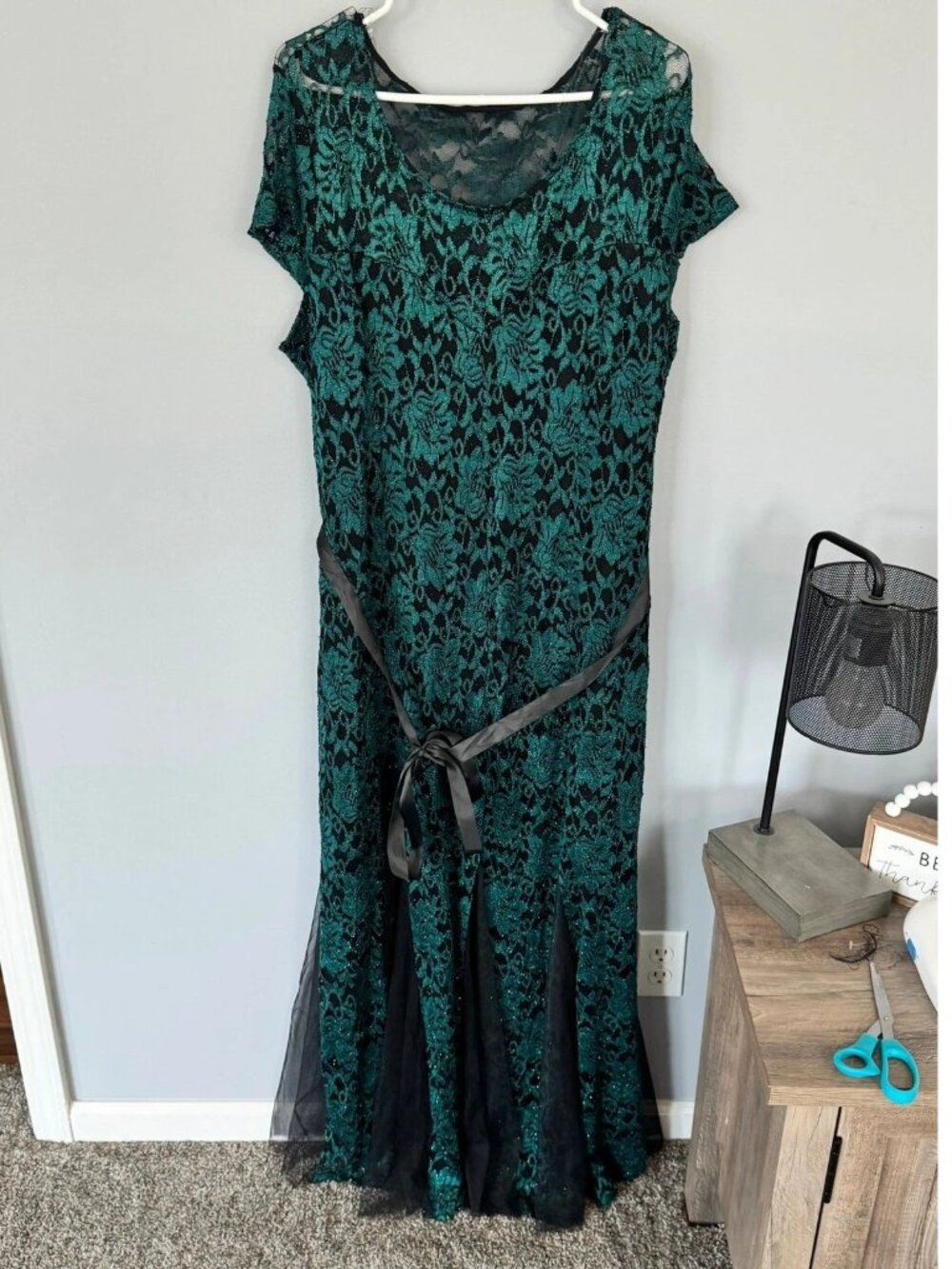 A cotton evening dress for women with a blend of green and black colors